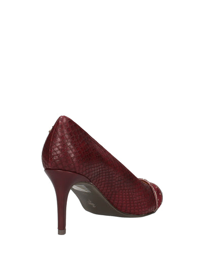 Menbur décolleté in ecopelle stampata e scamosciata con borchie decorative