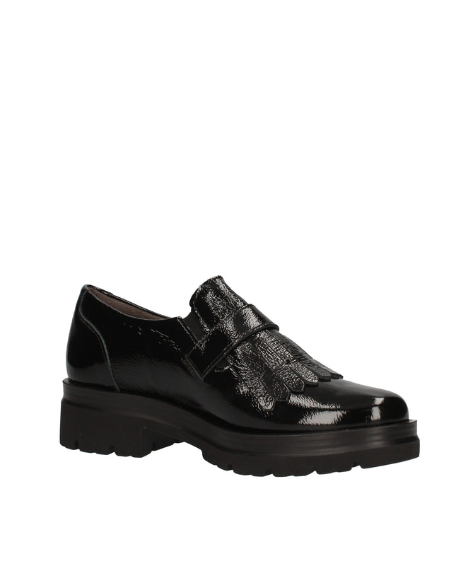 Pitillos slip on in vernice con frange decorative