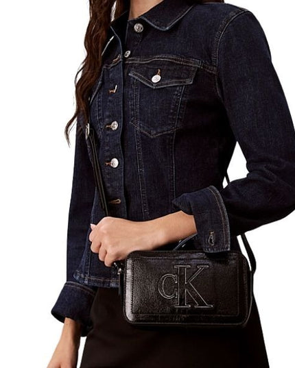 Calvin Klein borsa a tracolla in naplack lucida e increspata nera