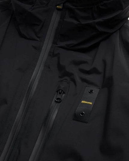 BLAUER Jarvis impermiabile uomo idrorepellente con cappuccio fisso interno in morbida pelliccia ecologica taschino con zip spalmata sul petto polsino con elastico rigato e patch e passante con logo