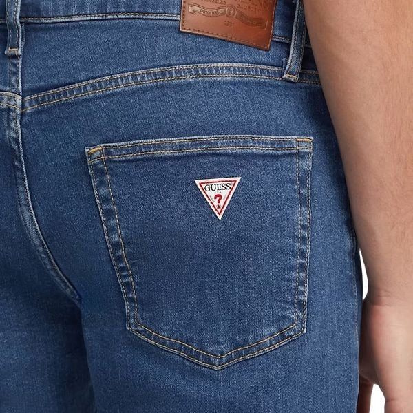 GUESS Slim jeans uomo denim stretch cinque tasche con chiusura con zip dettagli caratteristici del marchio