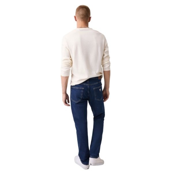 GUESS Slim jeans uomo cinque tasche aderente sui fianchi chiusura con zip e bottone