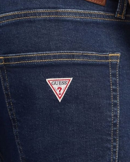 GUESS Slim jeans uomo cinque tasche aderente sui fianchi chiusura con zip e bottone