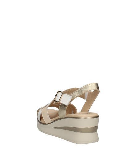 Pitillos sandali con zeppa, fasce intrecciate in pelle e cinturino