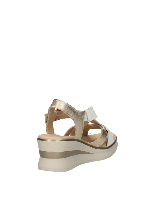 Pitillos sandali con zeppa, fasce intrecciate in pelle e cinturino